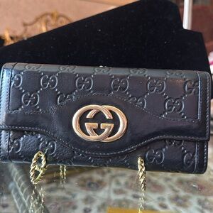 Gucci Black Wallet with Gold Accents